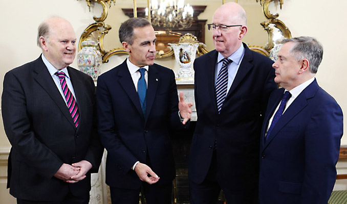 28/01/2015 NO REPRO FEE, MAXWELLS DUBLIN. Picture shows l-r, Minister for Finance, Michael Noonan; Mark Carney, Governor of the Bank of England; Minister for Foreign Affairs and Trade, Charles Flanagan and Brendan Howlin, TD, Minister for Public Expenditure and Reform.